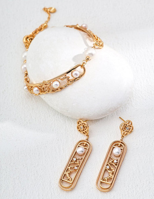 Pearl gold earring and bracelet